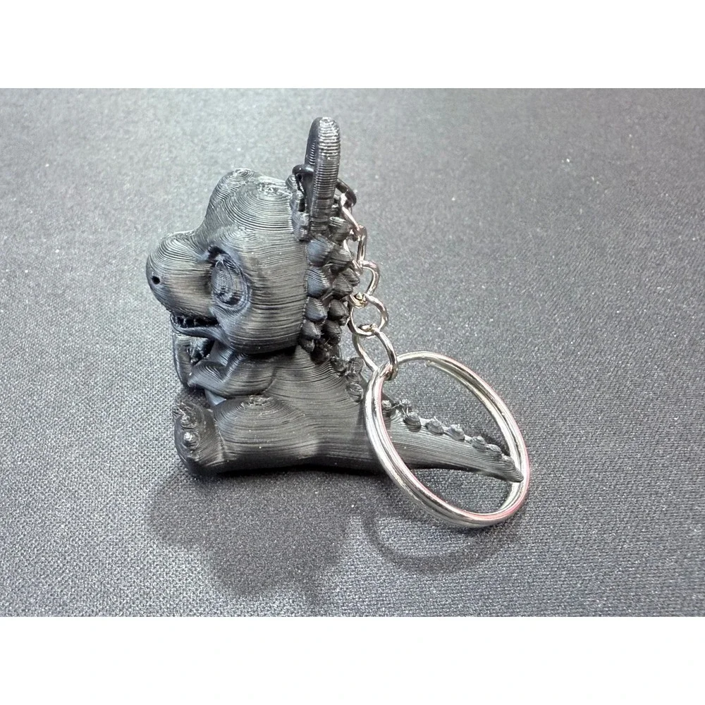 3D Printed Baby Dinosaur Keychain Metallic Charcoal Cute T-Rex Accessory